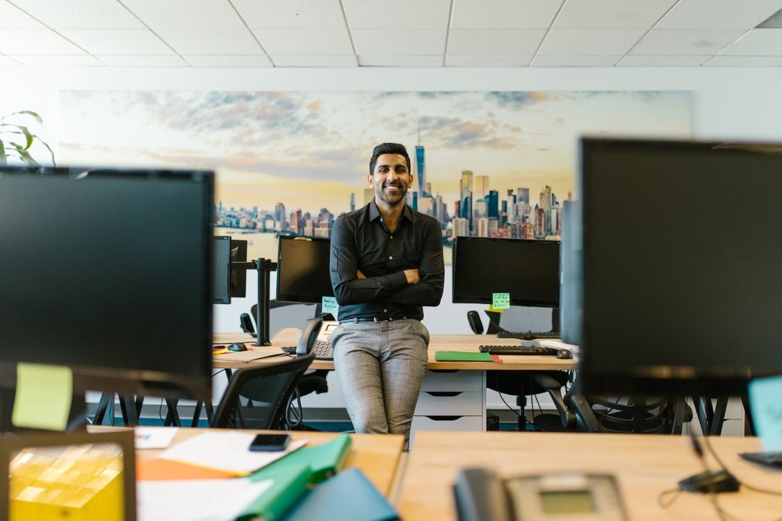 Professional Bangladeshi entrepreneur in a UAE office — UAE free zone company setup 2026 guide for Bangladeshi nationals