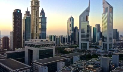 Emirates Towers in Dubai at dawn, representing UAE corporate tax registration deadlines and the AED 10,000 late-registration penalty for free zone companies