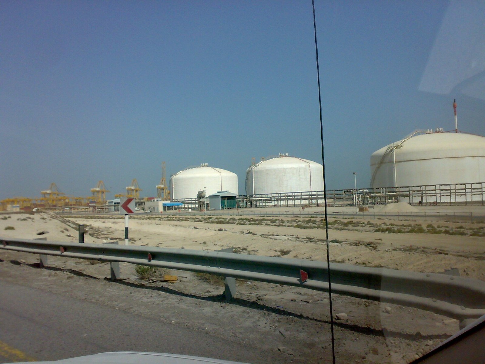 Warehouse and office units in Jebel Ali Free Zone, Dubai, where small free zone companies weigh Small Business Relief against Qualifying Free Zone Person status