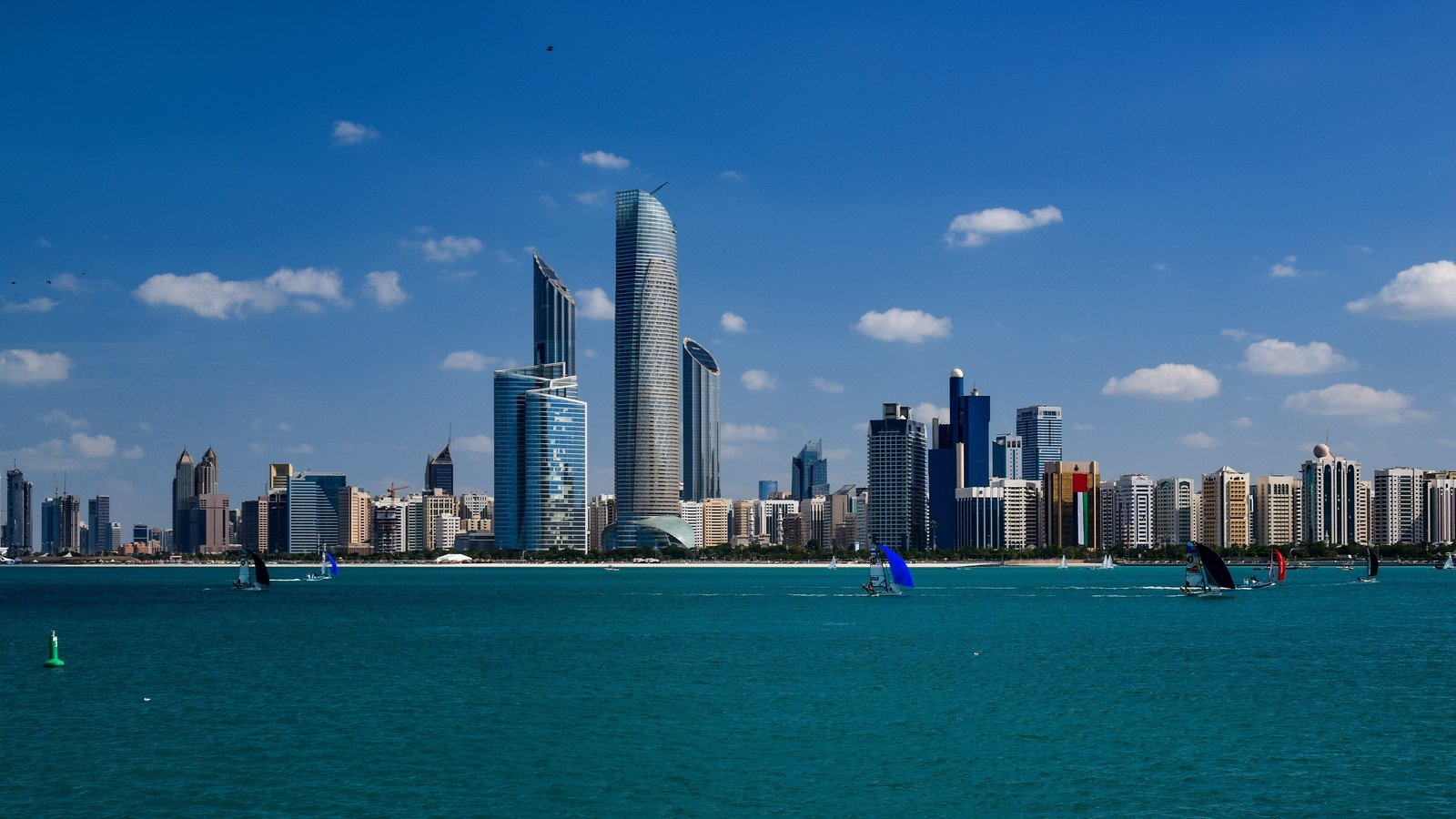 Abu Dhabi skyline representing free zone license cost comparison 2026