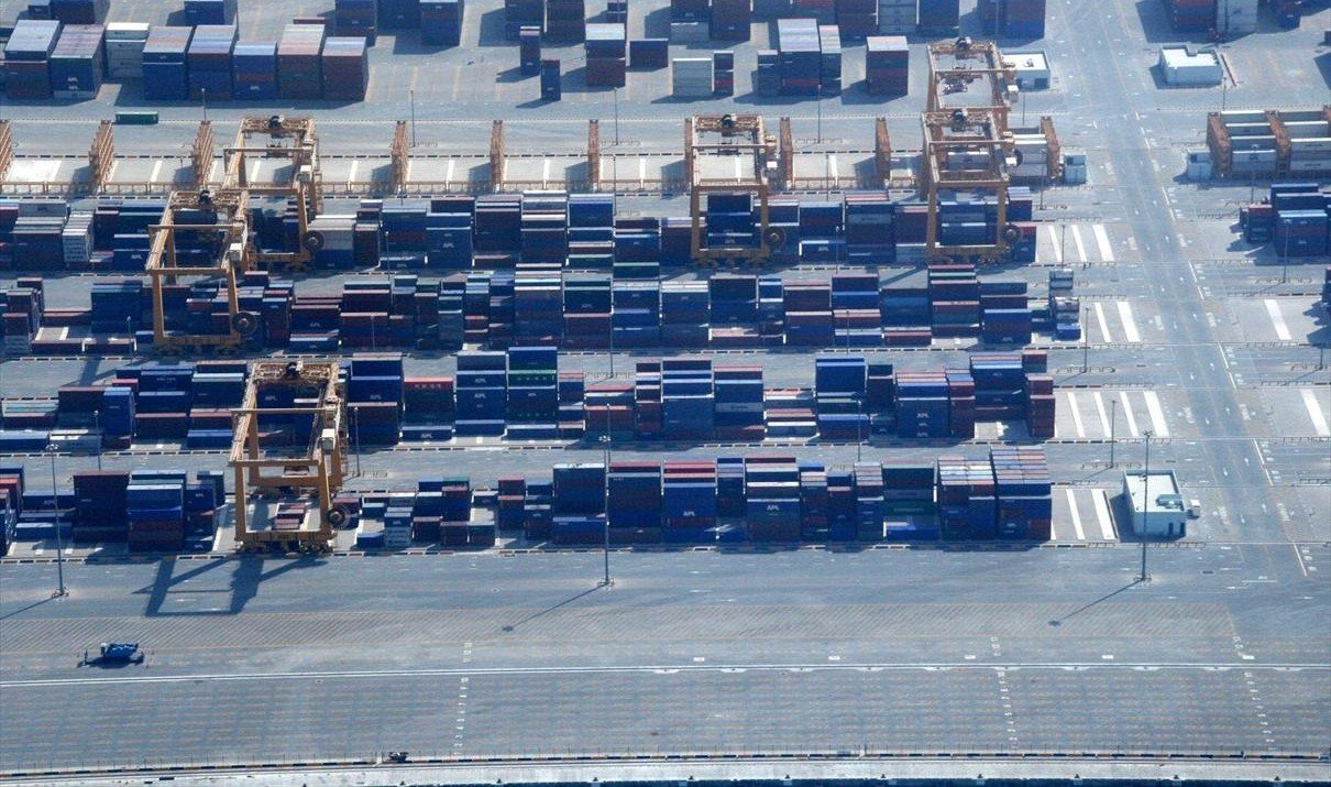 Container terminal at Port Jebel Ali where UAE free zone re-export cargo clears customs