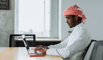 UAE free zone for Egyptian entrepreneurs — business professionals reviewing company setup documents in Dubai