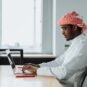 UAE free zone for Egyptian entrepreneurs — business professionals reviewing company setup documents in Dubai