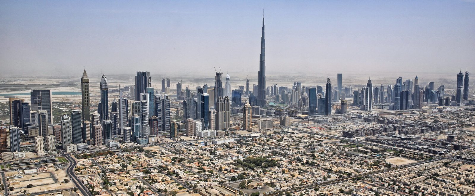 UAE e-invoicing 2026 Dubai skyline free zone compliance