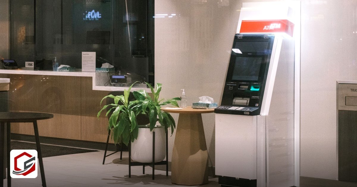 Bank Account for Foreign E-Commerce in Sharjah Media City - an machine stands in a modern bank lobby, next to a plant