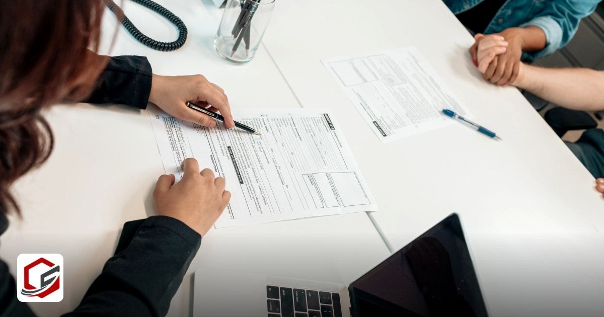 UAE Company Setup for Uzbek Citizens – Visa, Banking & Docs - a professional meeting with document signing at an office